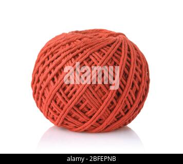 Clew of red cotton thread isolated on white Stock Photo