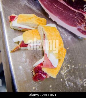 excellent and healthy snack, focaccia or bread with fresh mozzarella and tasty ham Stock Photo