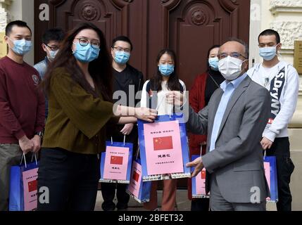 Vienna, Austria. 17th Apr, 2020. Chinese Ambassador to Austria Li Xiaosi (R, front) distributes health kits to overseas Chinese students at the Chinese Embassy in Vienna, Austria, April 17, 2020. The Chinese Embassy in Austria distributed health kits consisting of face masks and disinfection wipes to representatives of overseas Chinese students here on Friday. Credit: Guo Chen/Xinhua/Alamy Live News Stock Photo