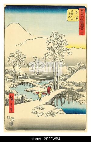 HIROSHIGE Vintage 1800s illustration ‘Utagawa Hiroshige’ : Numazu: Mount Fuji and Mount Ashigara after snow ... Numazu ashigarayama fuji yikihare Series Title: Fifty-three Famous Views, known as Vertical Tokaido (or Famous Places of the Fifty-three Stations of the Tōkaidō) Hiroshiges remarkable skill in rendering snow scenes. Two travelers cross the Kise River over a footbridge as they approach an inn at the Numazu station. This sheet is from the last series that Hiroshige published  Utagwa Hiroshige, born Andō Hiroshige, was a Japanese ukiyo-e artist, considered the last great master Stock Photo