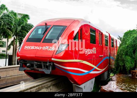 Red Sentosa Express Train while going towards Sentosa Park, Singapore, March 30, 2020 Stock Photo