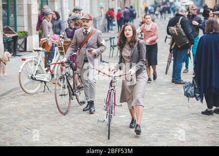 Lviv, Ukraine - May 4, 2019: city birthday festival people ride old retro bicycles Stock Photo