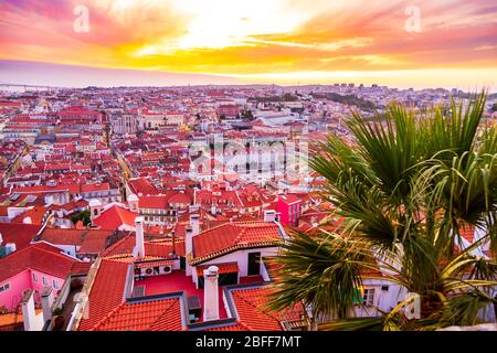 Beautiful panorama of old town and Baixa district in Lisbon city during sunset, seen from Sao Jorge Castle hill, Portugal Stock Photo