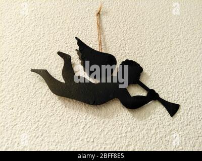 Ornamental pendant hanging on the wall Stock Photo