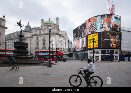 London, UK. 18th Apr, 2020. Government messages to stay at home during the coronavirus pandemic are shown on the digital billboard in Piccadilly Circus, London, UK on April 18, 2020. (Photo by Claire Doherty/Sipa USA) Credit: Sipa USA/Alamy Live News Stock Photo