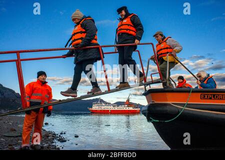 Skorpios III passengers disembarking at Amalia Glacier On The Edge Of The Sarmiento Channel - Skua Glacier - Bernardo O'Higgins National Park in Patag Stock Photo