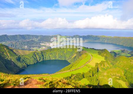 Viewpoint Miradouro da Boca do Inferno in Sao Miguel Island, Azores, Portugal. Amazing crater lakes surrounded by green fields and forests. Beautiful Portuguese landscape. Horizontal photo. Stock Photo