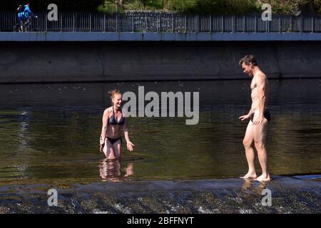 Mala Skala, Czech Republic. 18th Apr, 2020. Swimmers in the Jizera in Mala Skala in the Czech Paradise. Many people are enjoying weekend with sunshine and temperatures around 21 degrees Celsius. The Czech Republic government starting to ease restrictions. Credit: Slavek Ruta/ZUMA Wire/Alamy Live News Stock Photo