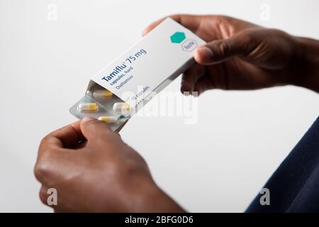 Illustrative image of a Tamiflu box and tablets. Stock Photo