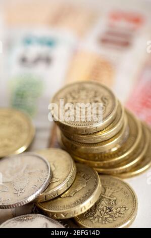 Illustrative image of various denomination sterling notes and coins. Stock Photo