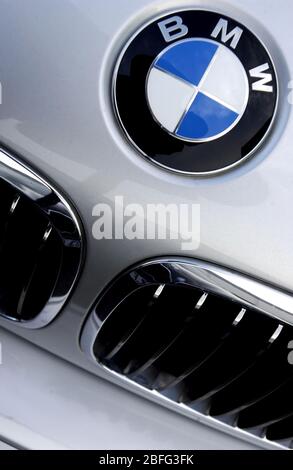 Picture shows the badge and grille of a BMW vehicle. Stock Photo