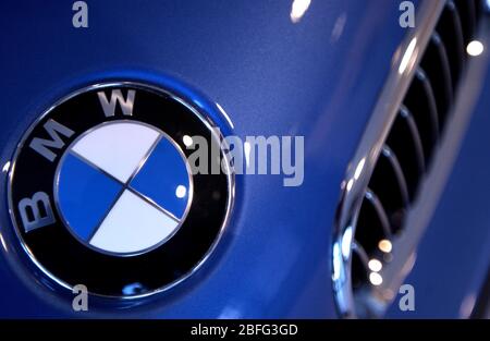 Picture shows the badge and grille of a BMW vehicle. Stock Photo