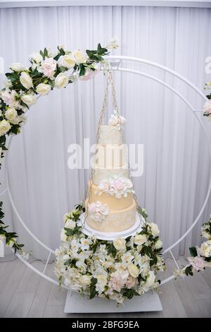 A beautiful big cake for a special event. Sweet table for special party Stock Photo