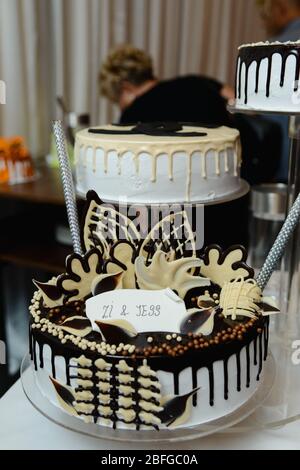 A beautiful big cake for a special event. Sweet table for special party Stock Photo