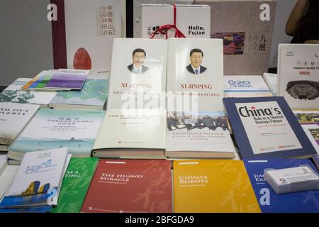 BELGRADE, SERBIA - OCTOBER 25, 2019: Propaganda books, mainly the book of Chinese President Xi Jiping, Governance of China, for sale on a bookstore sh Stock Photo