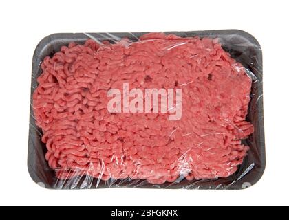 Black Foam tray with ground beef, 85 percent fat free, wrapped in plastic isolated on white. Stock Photo