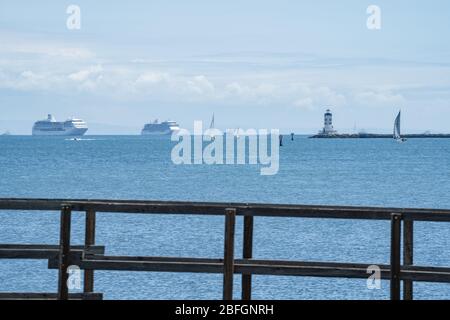 Cruise ships anchor off the coast of San Pedro, CA, while they wait out the travel restrictions due to Covid-19 crisis Stock Photo