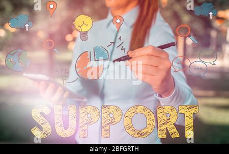 Handwriting text writing Support. Conceptual photo to agree with and give encouragement to someone or something Stock Photo