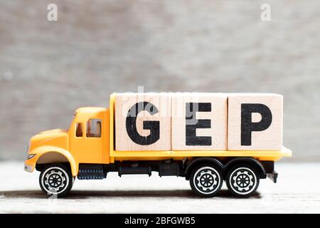 Truck hold letter block in word GEP (abbreviation of good engineering practice) on wood background Stock Photo