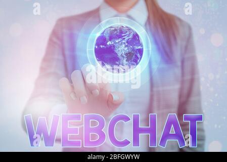 Handwriting text writing Webchat. Conceptual photo system that allows users to communicate in real time using internet Elements of this image furnishe Stock Photo