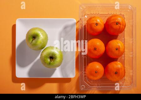 Oranges and apples from top view Stock Photo