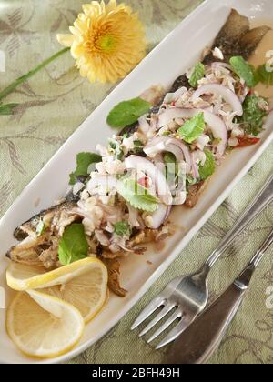 fried fish with fish sauce delicious thai food Stock Photo