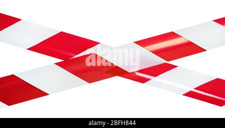 Red and white lines of barrier tape, forbids passage, close up Stock Photo