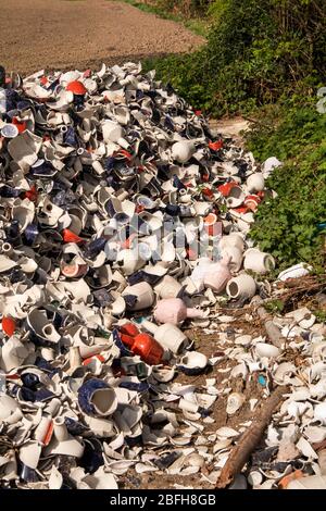 UK, England, Cheshire, Astbury, Ackers Crossing, pile of scrap Wade ceramics in field entrance to use as hardcore Stock Photo