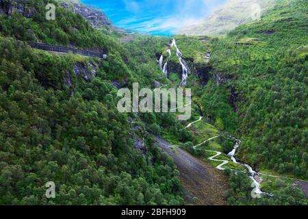 road and waterfalls in famous Flam valley, Norway Stock Photo