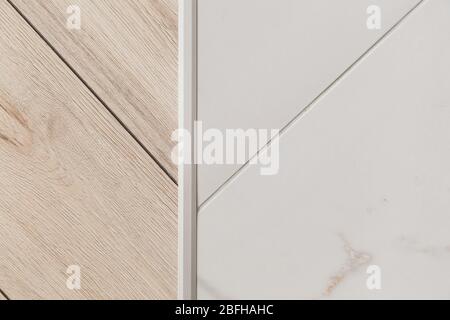 Laminate and tile floor joints - floor connector - decorative strip or sill Stock Photo