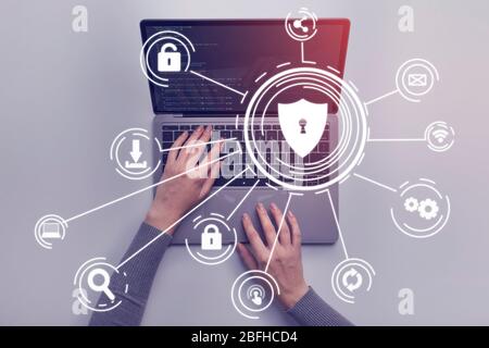 Hacker attack concept. Woman hands on laptop Stock Photo