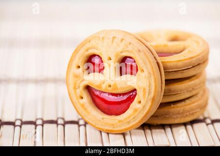 smiling strawberry jam cookies. Close up photo Stock Photo