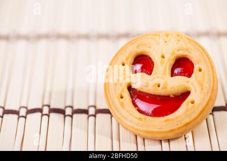 smiling strawberry jam cookies. Close up photo Stock Photo