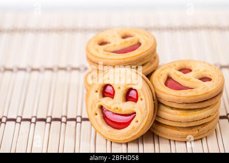 smiling strawberry jam cookies. Close up photo Stock Photo