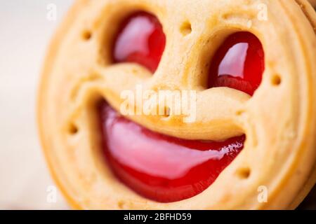 smiling strawberry jam cookies. Close up photo Stock Photo