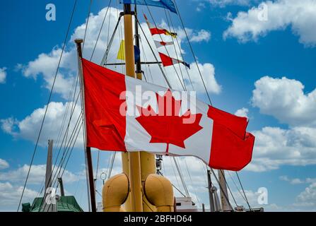 Canadian Flag on Old Ship Mast Stock Photo