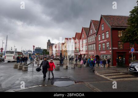 Bergen, Norway - August 13, 2019: Colorful wooden houses on Bryggen, traditional architecture in the city of Bergen and UNESCO World Cultural Heritage Stock Photo