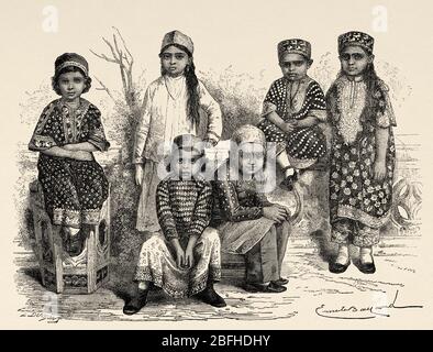 Portrait of parsee children from Bombay, India. Old engraving illustration Prince of Wales Albert Edward tour of India. El Mundo en la Mano 1878 Stock Photo