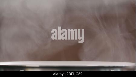 steam rising from pot while cooking closeup Stock Photo