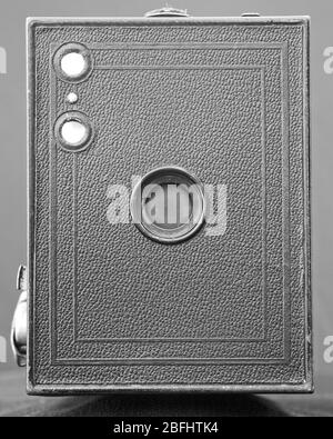 A close-up monochrome image of a Kodak Box Brownie vintage black and white camera from the 1920's. Stock Photo