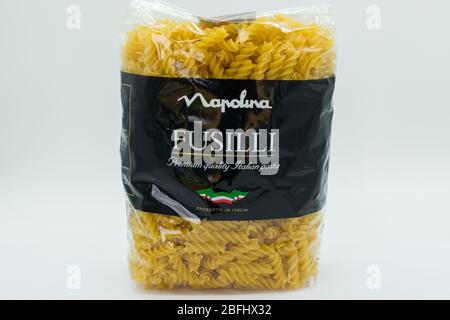 Irvine, Scotland, UK - April 18, 2020: Napolina branded bag of Fusilli Italian Pasta in plastic bag that will be recyclable in most UK local authoriti Stock Photo