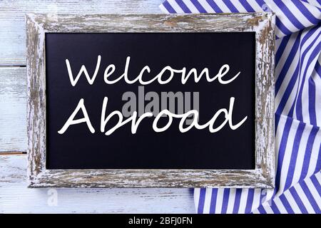 Welcome abroad written on chalkboard, close-up