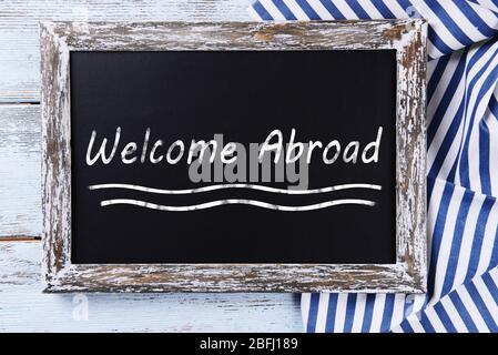 Welcome abroad written on chalkboard, close-up
