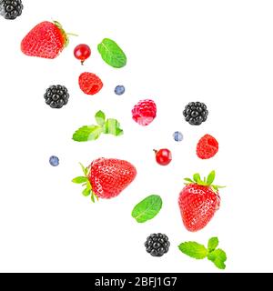 Falling berries isolated on white Stock Photo