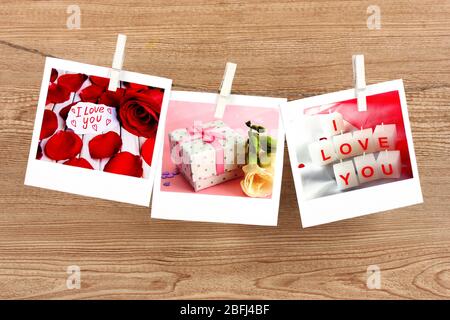 Photo cards hanging on the clothesline, Valentine's Day concept Stock Photo