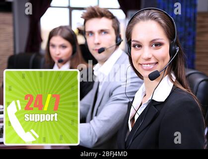 Call center operators at office, Round-the-clock support concept Stock Photo