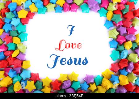 I love Jesus text in paper stars frame Stock Photo