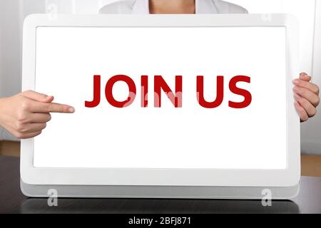 Woman pointing on tablet PC screen, Job searching concept Stock Photo