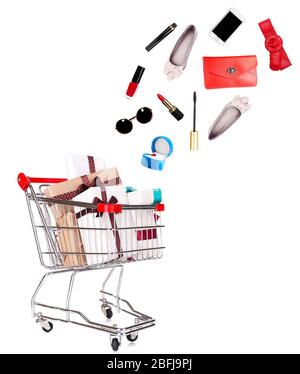 Goods falling into cart isolated on white Stock Photo