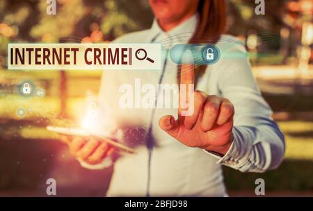 Writing note showing Internet Crime. Business concept for crime or illegal online activity committed on the Internet Stock Photo